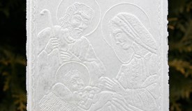 Opłatek - polnische Oblate, die an Wigilia vor dem Abendessen als Zeichen der Versöhnung ge- und verteilt wird.